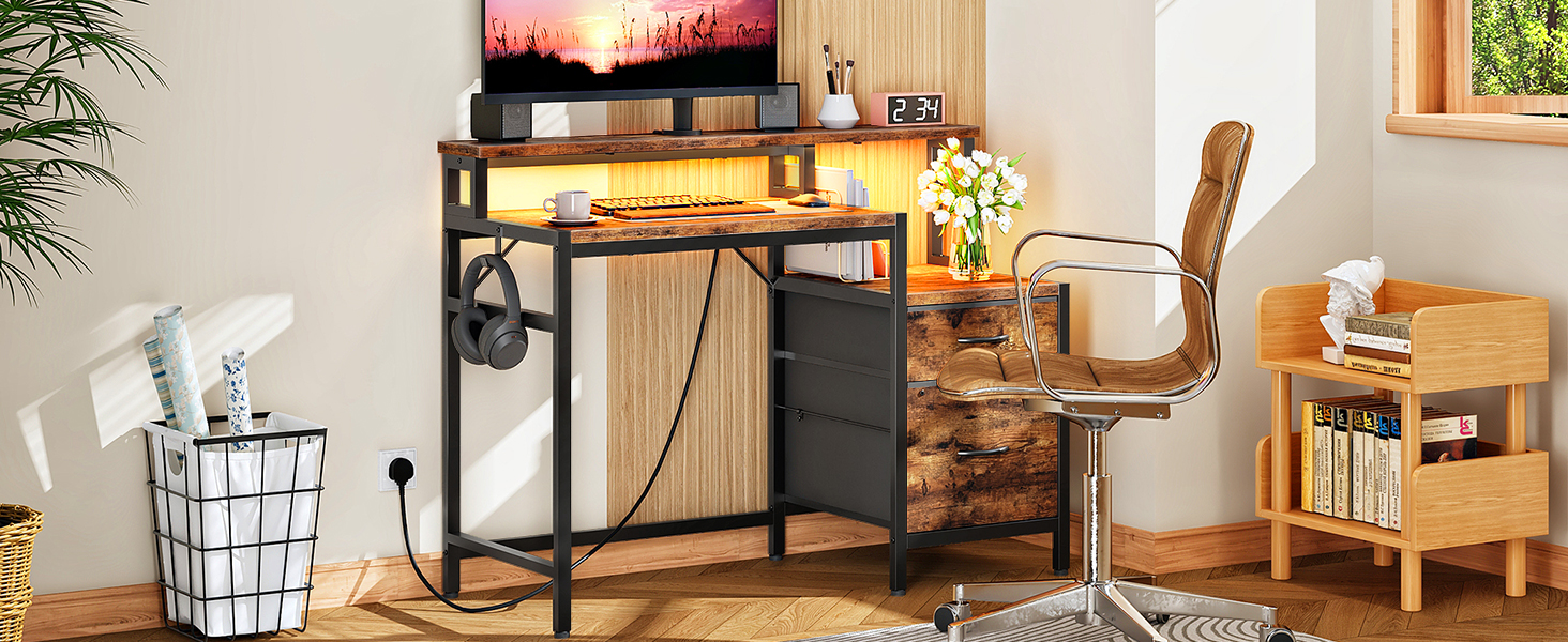 Modern industrial-style desk setup with black metal frame, wooden top, and storage shelves, positioned against a wall with decor